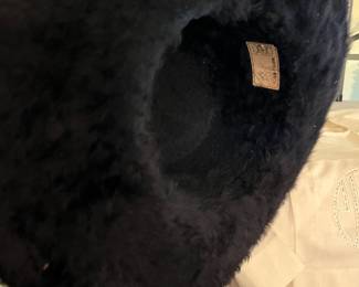 Manfred Beaver black beaverette hat, wide brim, a
wide ribbon around the crown