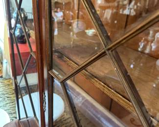 Mahogany bibliotheque with glass doors.