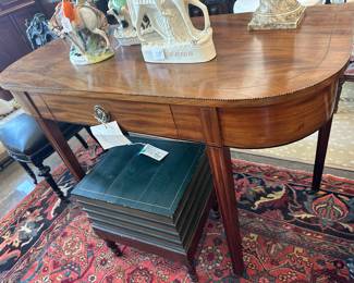 Late Regency English inlaid console with cross banding. Demilune shape circa 1840.