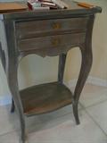There are two of these side tables