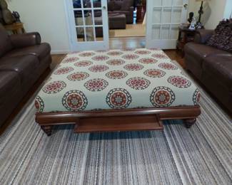 Large ottoman coffee table, area rug