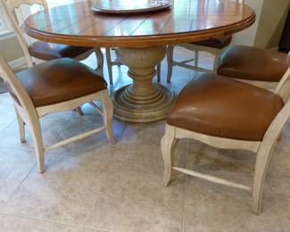 Round dining table with 6 ladder back chairs
