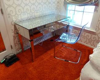 Mirrored desk, acrylic chair