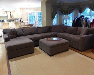 Sectional sofa with matching ottoman coffee table, area rug