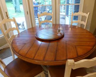 Round dining table with 6 ladder back chairs