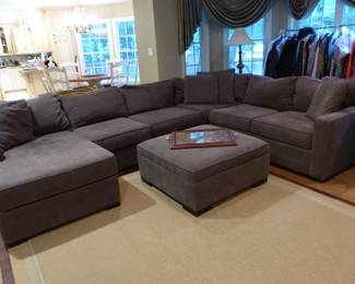 Sectional sofa with matching ottoman coffee table, area rug
