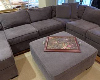 Sectional sofa with matching ottoman coffee table, area rug