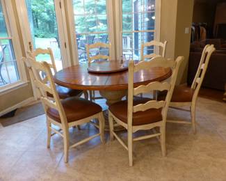 Round dining table with 6 ladder back chairs