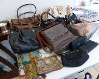 Authentic designer handbags including Louis Vuitton, Ferragamo, Celine, Armani, Hogan & more