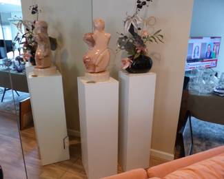 Pair of pedestals, marble sculpture by Gloria F. Klar, flower arrangement