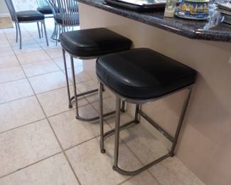 Pair of counter height backless bar stools