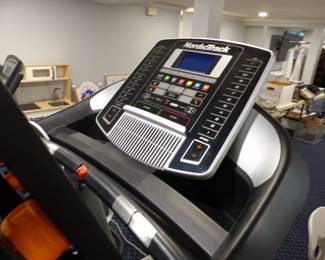 True Fitness recumbent bike, NordicTrack treadmill