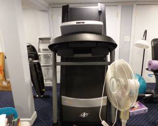 True Fitness recumbent bike, NordicTrack treadmill