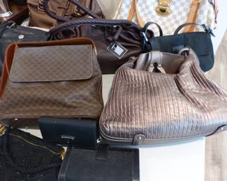 Authentic designer handbags including Louis Vuitton, Ferragamo, Celine, Armani, Hogan & more
