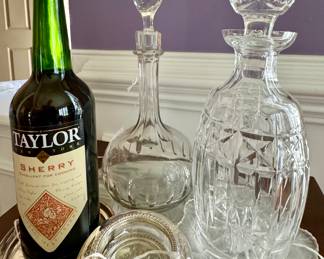 Decanturs, coasters, sterling hot plates, mirrored pieces for accents...