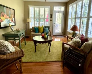 Sunroom is filled with like new teak and wicker furniture by Gloster - the coffee table is by Baker Furniture Co., floor lamps, pillows, new throw blankets and more...