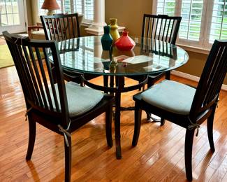 Best looking table ever...base looks like a series of belts welded together - Pottery Barn chairs