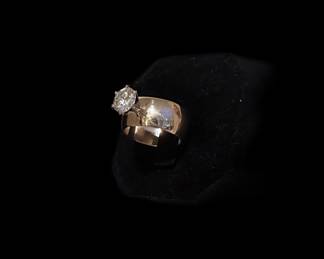 2.33CT Natural Diamond in a six prong setting with wide 14KT Gold Band.   Absolutely Gorgeous. 