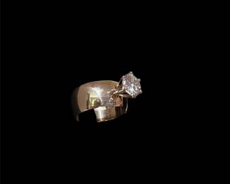 2.33CT Natural Diamond in a six prong setting with wide 14KT Gold Band.   Absolutely Gorgeous. 