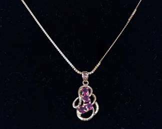 14K Gold & Ruby Necklace. The chain is very long.