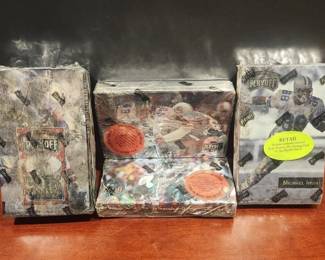 LOT OF 4 FACTORY SEALED NFL PLAYOFF WAX BOXES.
