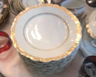 Elite Works Limoges from France. Some pieces show wear of gold and are priced accordingly.