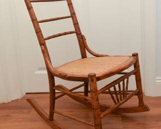 Antique cane seat rocking chair