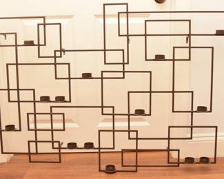 Metal wall terrarium with candle holders
