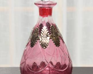 Rose glass and metal decanter