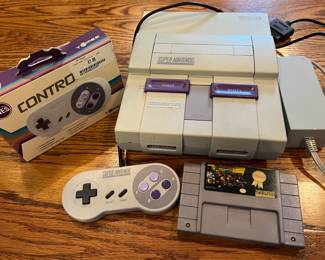 Super Nintendo Entertainment System (1991) with 2 controls