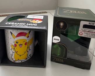 Pokemon mug and Zelda Green Rupee (new)