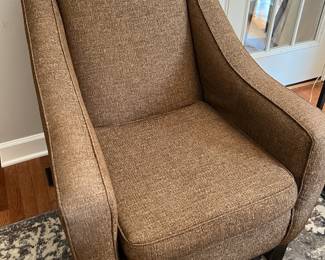 Brown upholstered chair (1 of 2)