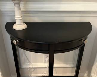 Black half-moon accent table