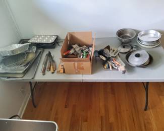 Baking pans, tins of utensils. Some antique 