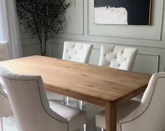 $1400 USD      Lulu & Georgia Reese Mid Century Modern Style Solid Wood Dining Table FFE258-5     With its natural finish and streamlined silhouette, the mid century modern Reese Dining Table is a tailored centerpiece for your dining area. Crafted from solid mango wood, the natural variations of the grain give it such rich character. This rectangular wooden dining table's understated look lets you complement it with patterned rugs, upholstered chairs, and eye-catching dinnerware.  Material: Oak Wood 

Dimensions: 82"W x 38"D x 30"H

Weight: 96 lbs

Condition: New.  Assembled.  Not packaged.  

Local pick up Gaithersburg, MD.  Contact us for shipper suggestions.