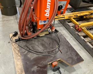 Pneumatic hinge machine for cabinets