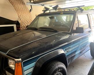 1986 2 DOOR, JEEP CHEROKEE, 4WD, STICK SHIFT WITH 48K MILES. SKI RACKS ON TOP! WILL PRESELL THE JEEP.