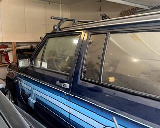 1986 2 DOOR, JEEP CHEROKEE, 4WD, STICK SHIFT WITH 48K MILES. SKI RACKS ON TOP! WILL PRESELL THE JEEP.