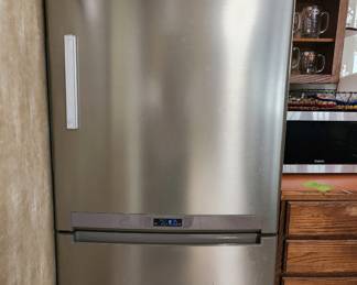 Samsung stainless fridge, 15 y/o, works great!