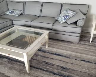 Handsome gray sectional by Platt's; coastal chic coffee table