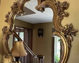 Filigree gold framed mirror