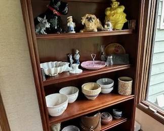 Bookcase with vintage crocks and vintage McCoy, Red Wing, Goebel, Rosenthal and Lefton pieces