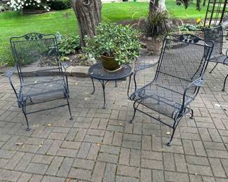 Wrought iron chairs and side table