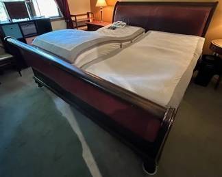 King-sized sleigh bed with sleep number mattresses