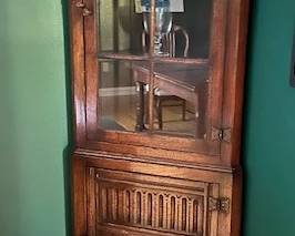 Matching corner cabinet made by Titchsmarsh & Goodwin Furniture Company