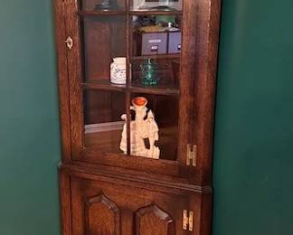 Antique corner cabinet reproduction made in 1999 from oak tree from family estate. Made by Titchsmarsh & Goodwin Furniture Co. 