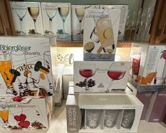 Several boxed wine, pilsner and champagne glasses (new in boxes)
