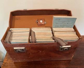 Sifton Praed & Co. St. James Street, S.W.1. thirty seven folding 1930's Bartholomew maps of England & Wales in a Hide Leather Case.  The leather case is in good condition with the exception of the stout handle is not connected to the case.