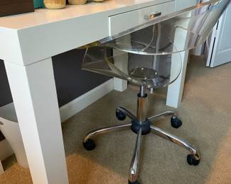 White Desk 48" W x 22" D x 30" H $150 Ghost Chair $35 (Crack on Chair seat)