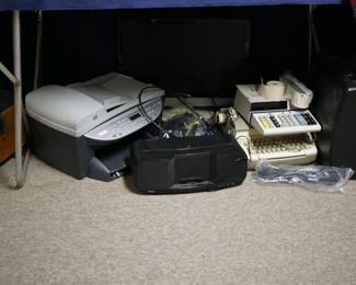 Two electric typewriters, printers, monitor and more